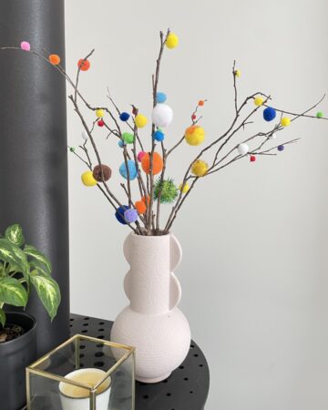 Bunch of pom pom crafts in vase