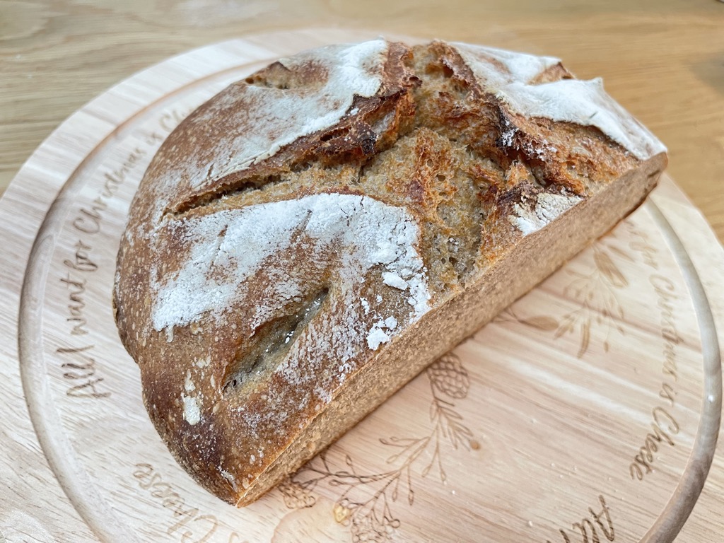 Half a loaf of whole wheat rye sourdough bread