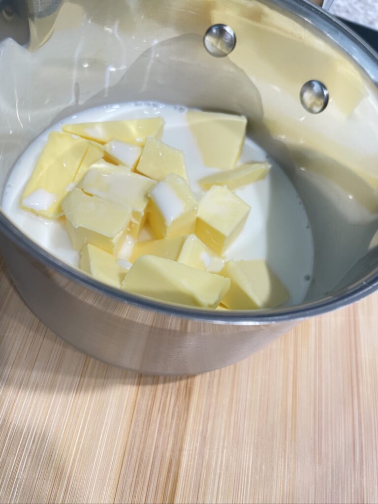 Butter and milk in sauce pan