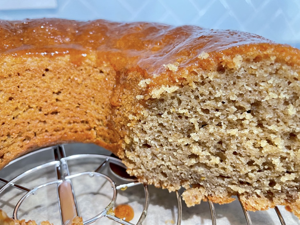 Close up shot of cut Earl Grey Honey Cake on cooling rack