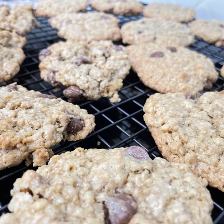 Cooling rack of chocolate chip oatmeal cookies