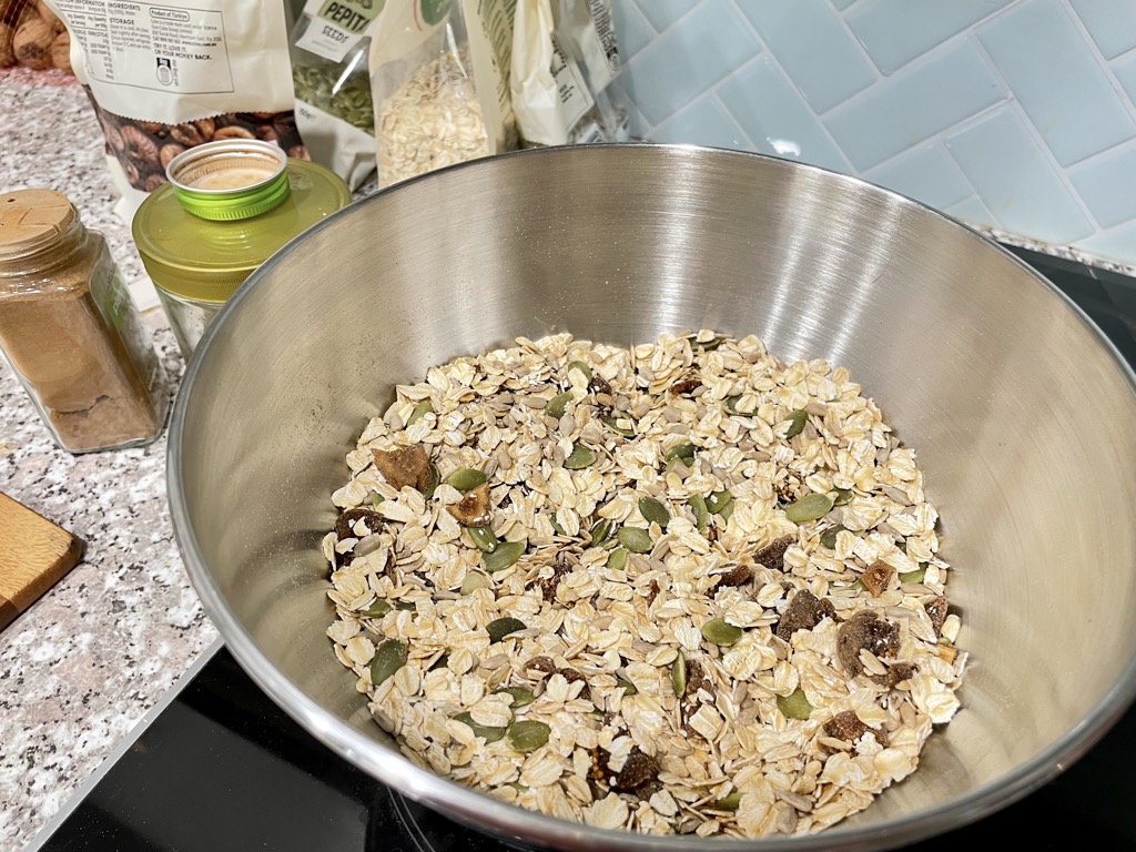 Silver bowl in kitchen filled with muesli