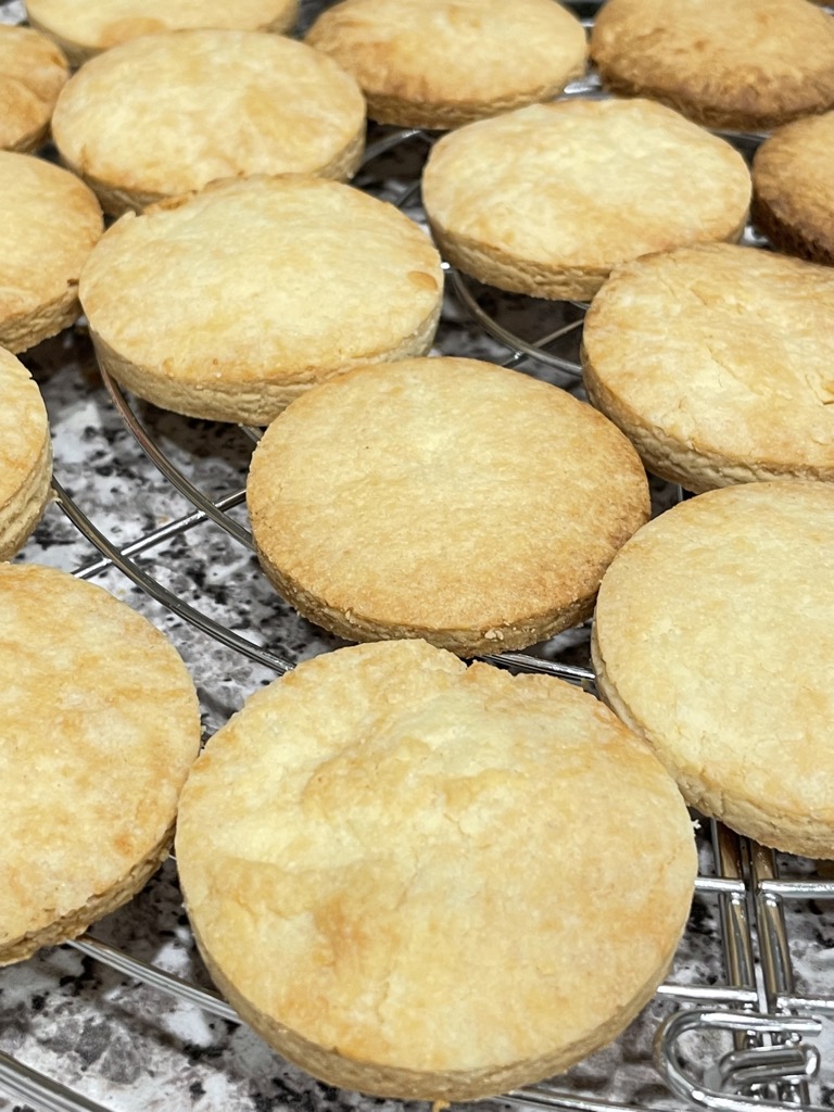 Classic almond flour shortbread biscuits placed on cooling rack