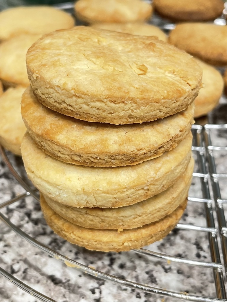 Stack of shortbread rounds on cooling rack