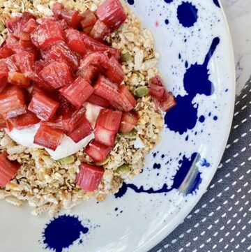 close up shot of Rustic Rhubarb Granola Bowl on linen napkin