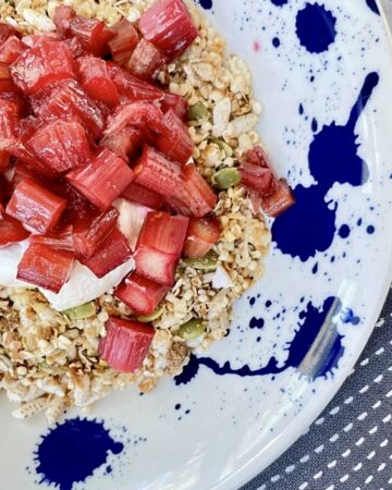 close up shot of Rustic Rhubarb Granola Bowl on linen napkin