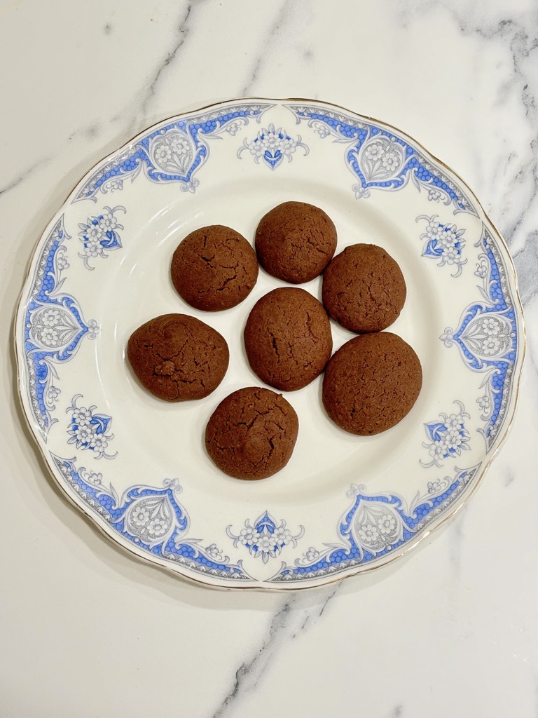 Nutella biscuits arranged on vintage plate