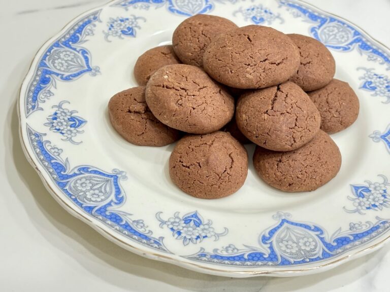 Nutella biscuits arranged on vintage plate