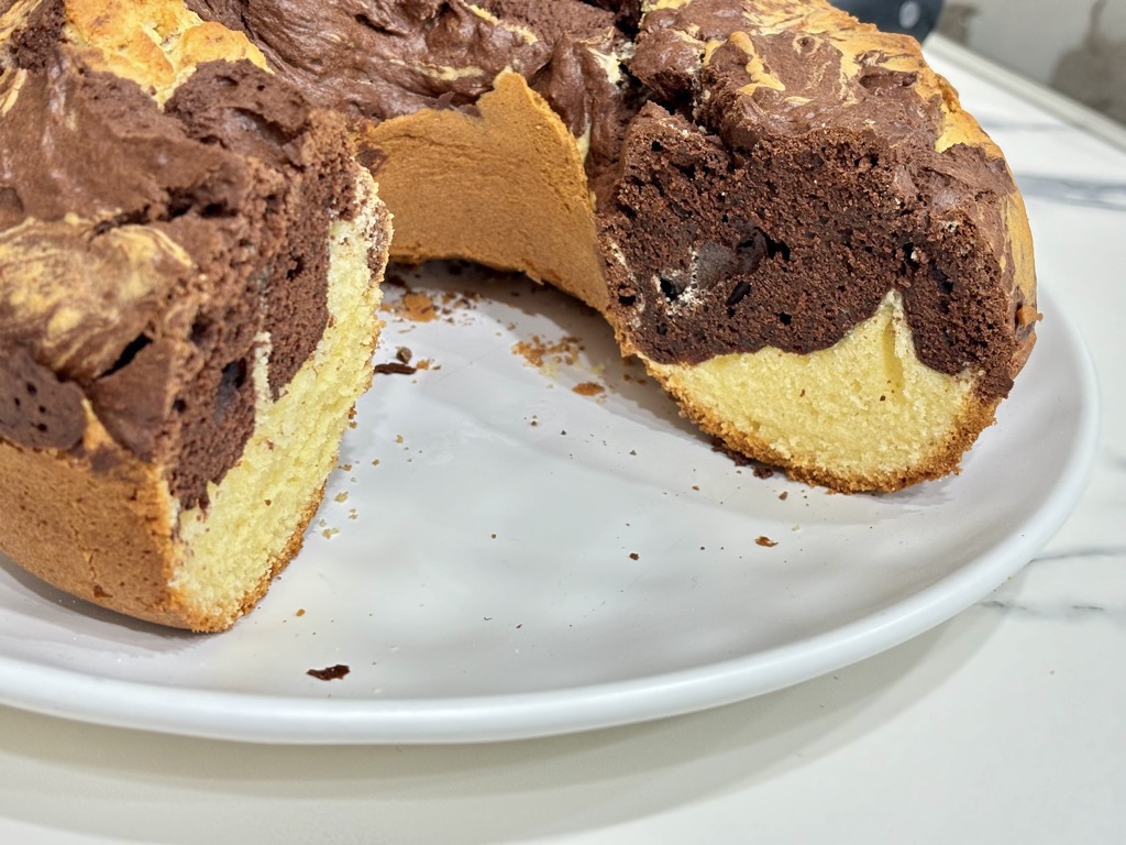 Marble cake cut on white platter