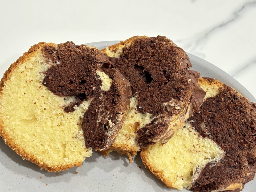 Three slices of marble cake on plate