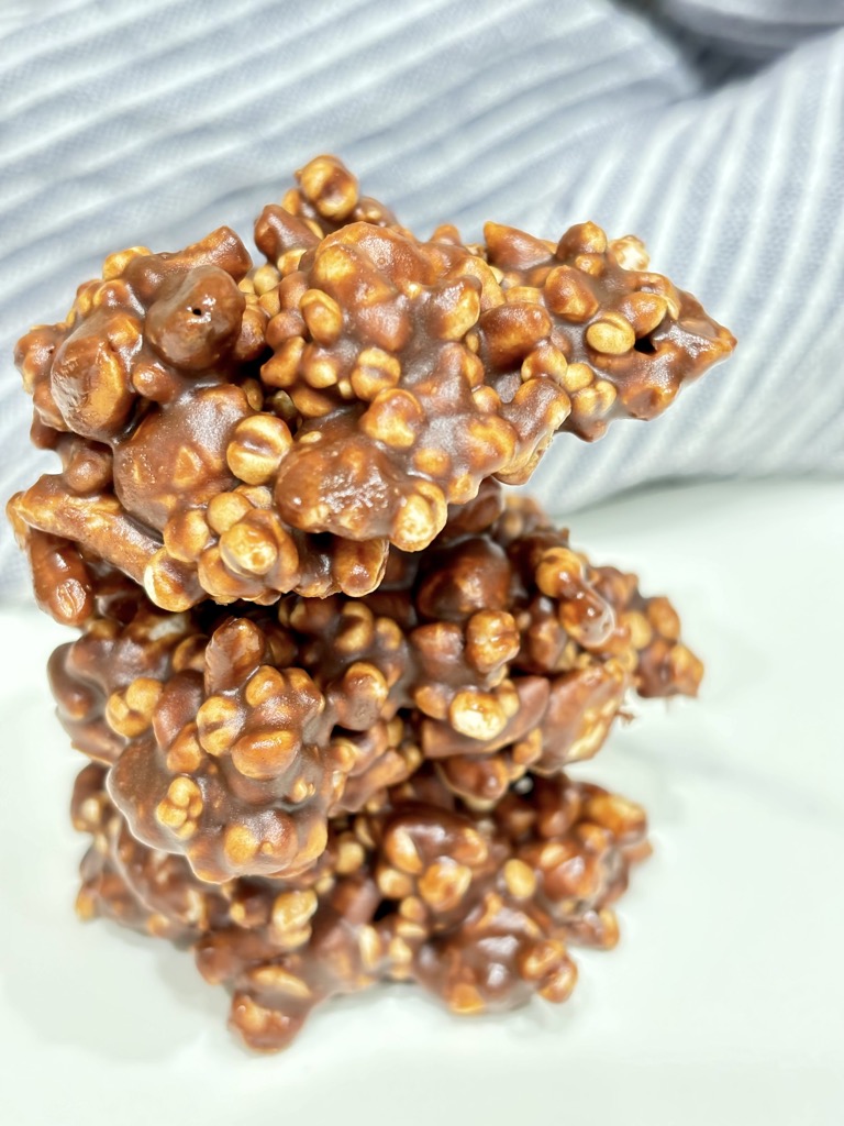 Stack of chocolate covered crunchy puffs