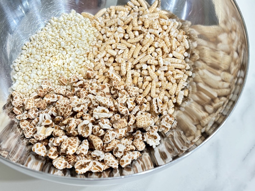 Three puffed grains in silver bowl