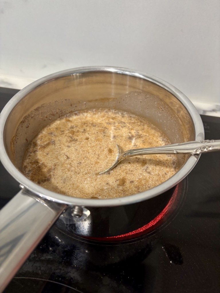 Rice Flakes Porridge ingredients in small saucepan on stove