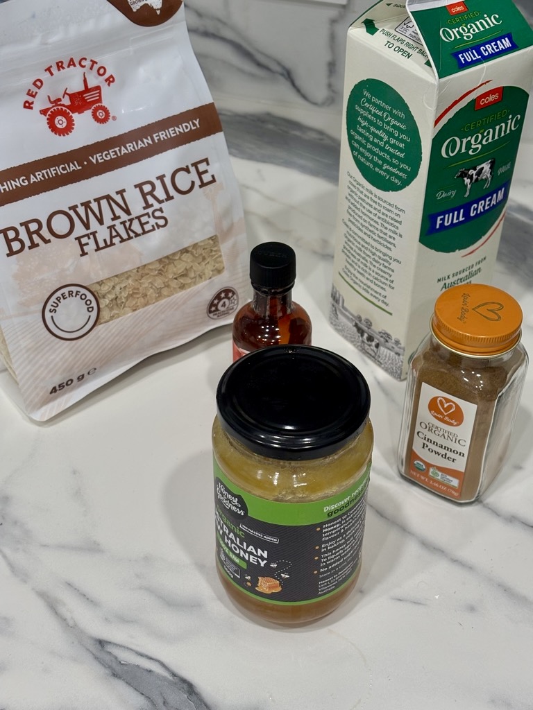 Ingredients for Rice Flakes Porridge lined up on bench top