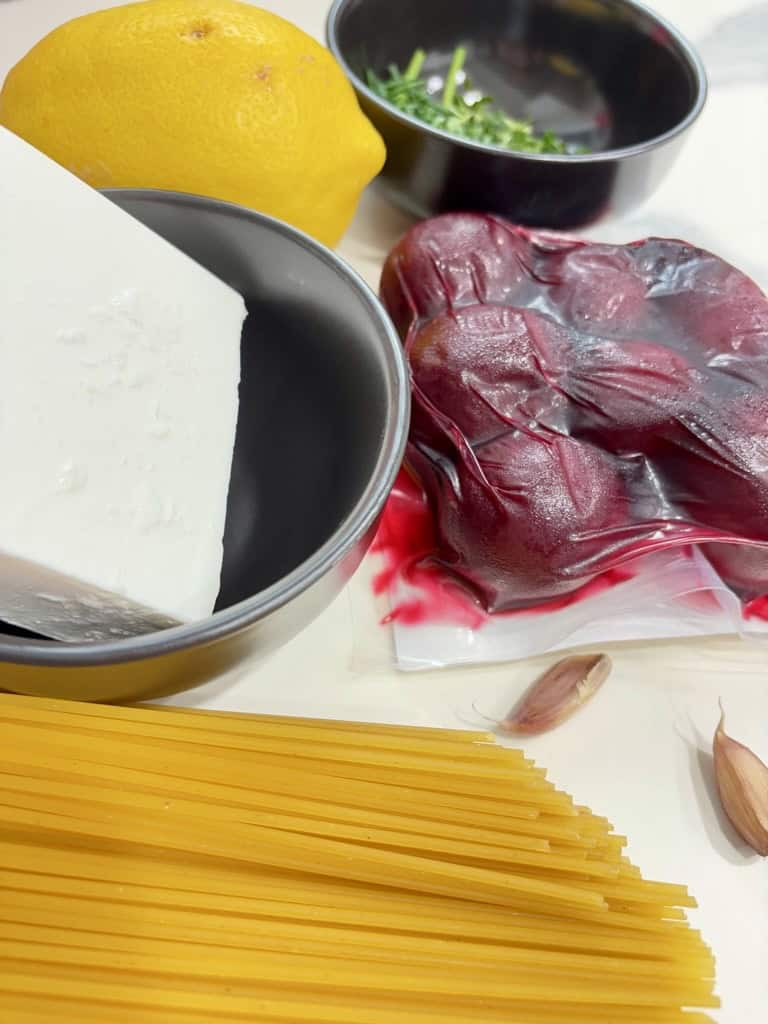 Ingredients for pink pasta sauce made from beetroot and feta