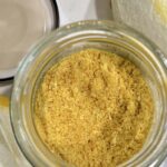 Top down shot of lemon powder in glass jar