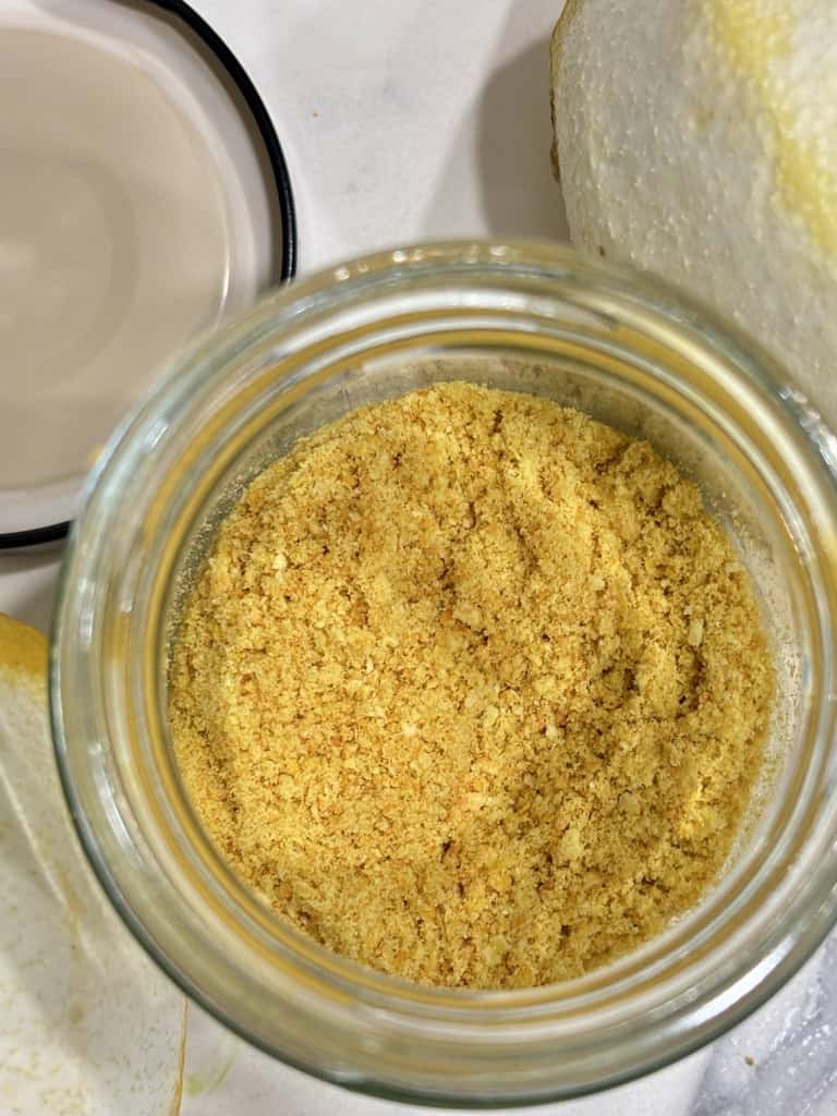 Top down shot of lemon powder in glass jar