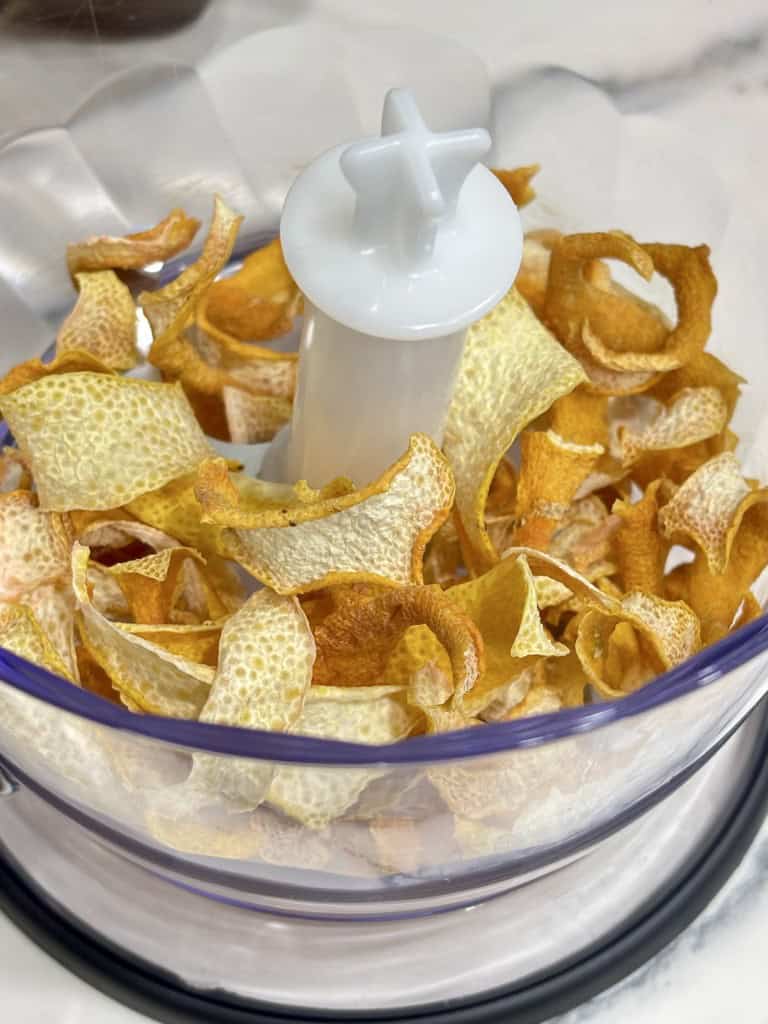 Dried lemon peels in food processor