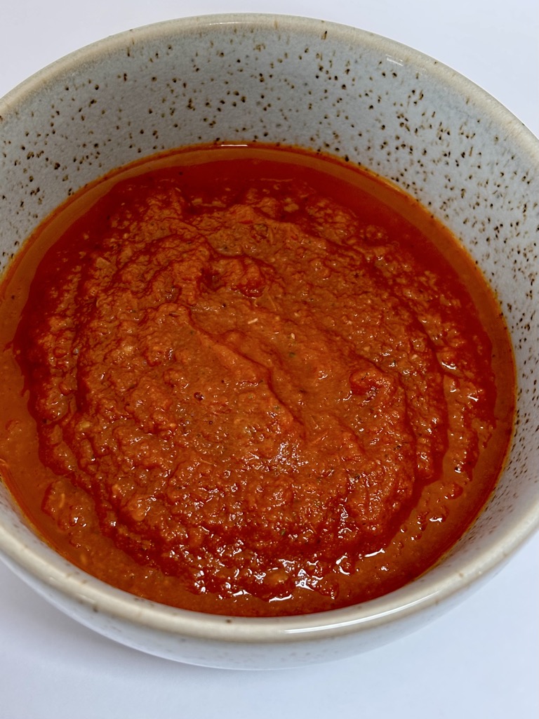 Close up shot of Fresh tomato sauce in bowl