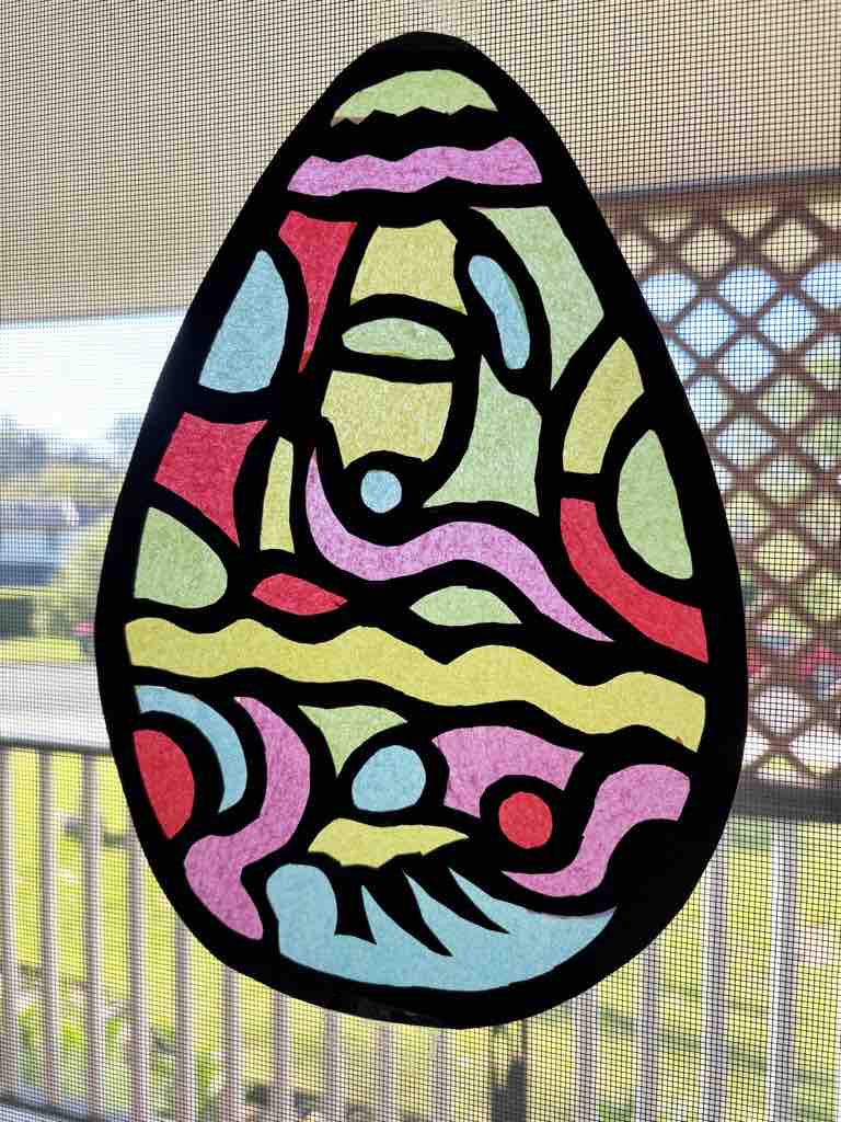 Easter egg suncatcher on window